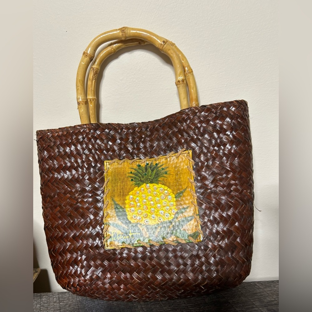 Sun N Sand woven purse with bamboo handles.